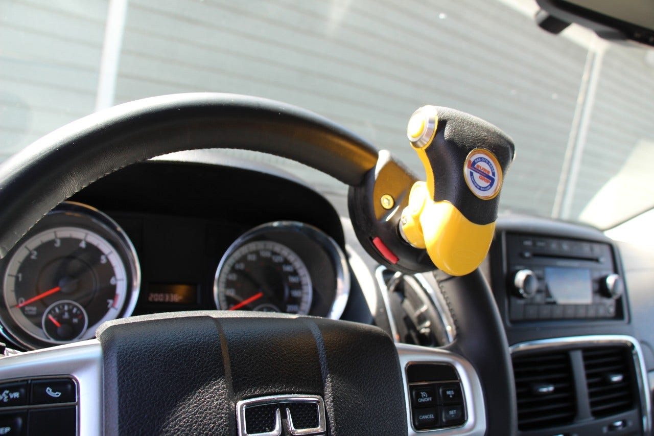 Secondary Controls for Cars and Wheelchair Vans installed steering wheel