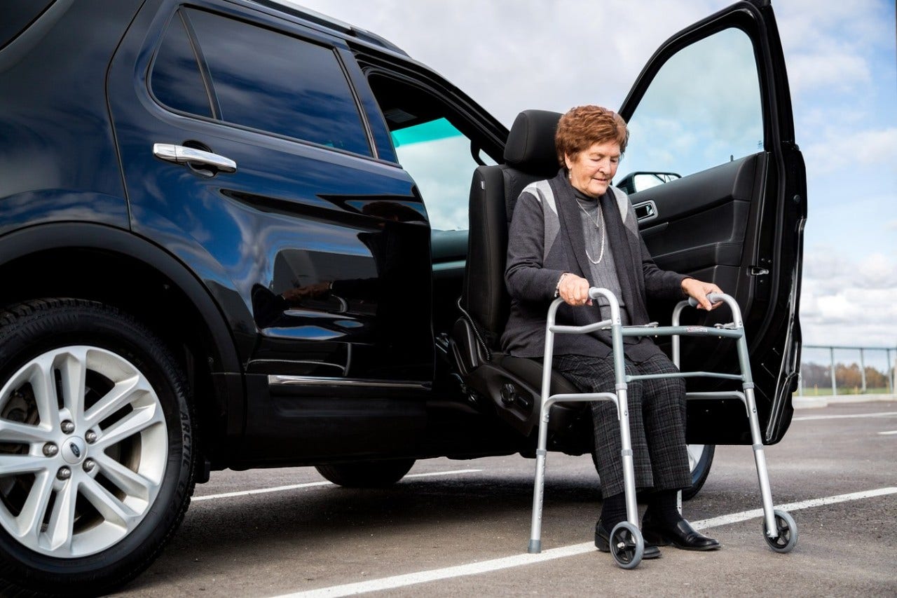 Adapt Solutions LINK seat woman exiting vehicle