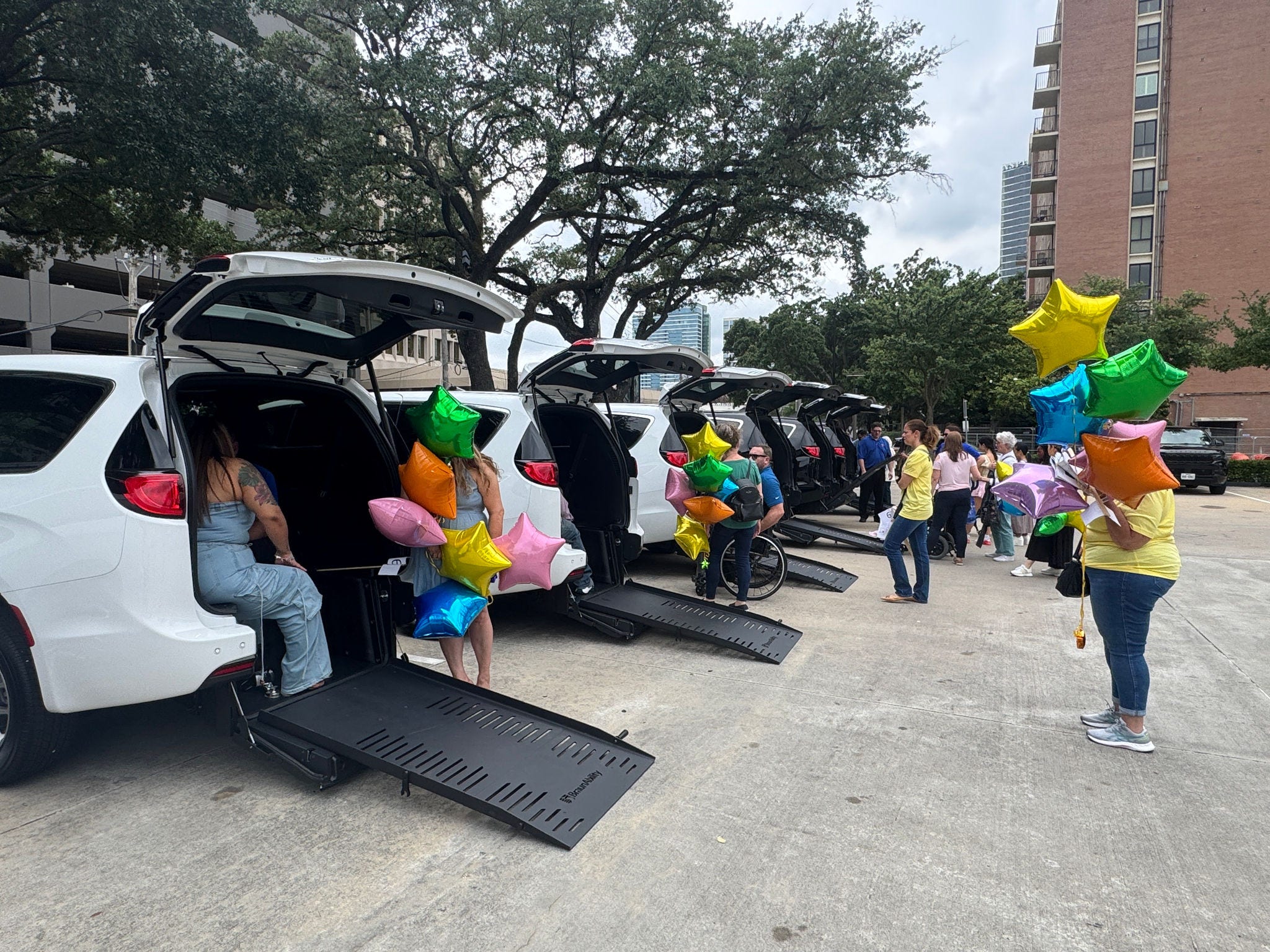 Houston Children's Charity and United Access deliverd 66 wheelchair accessible vans