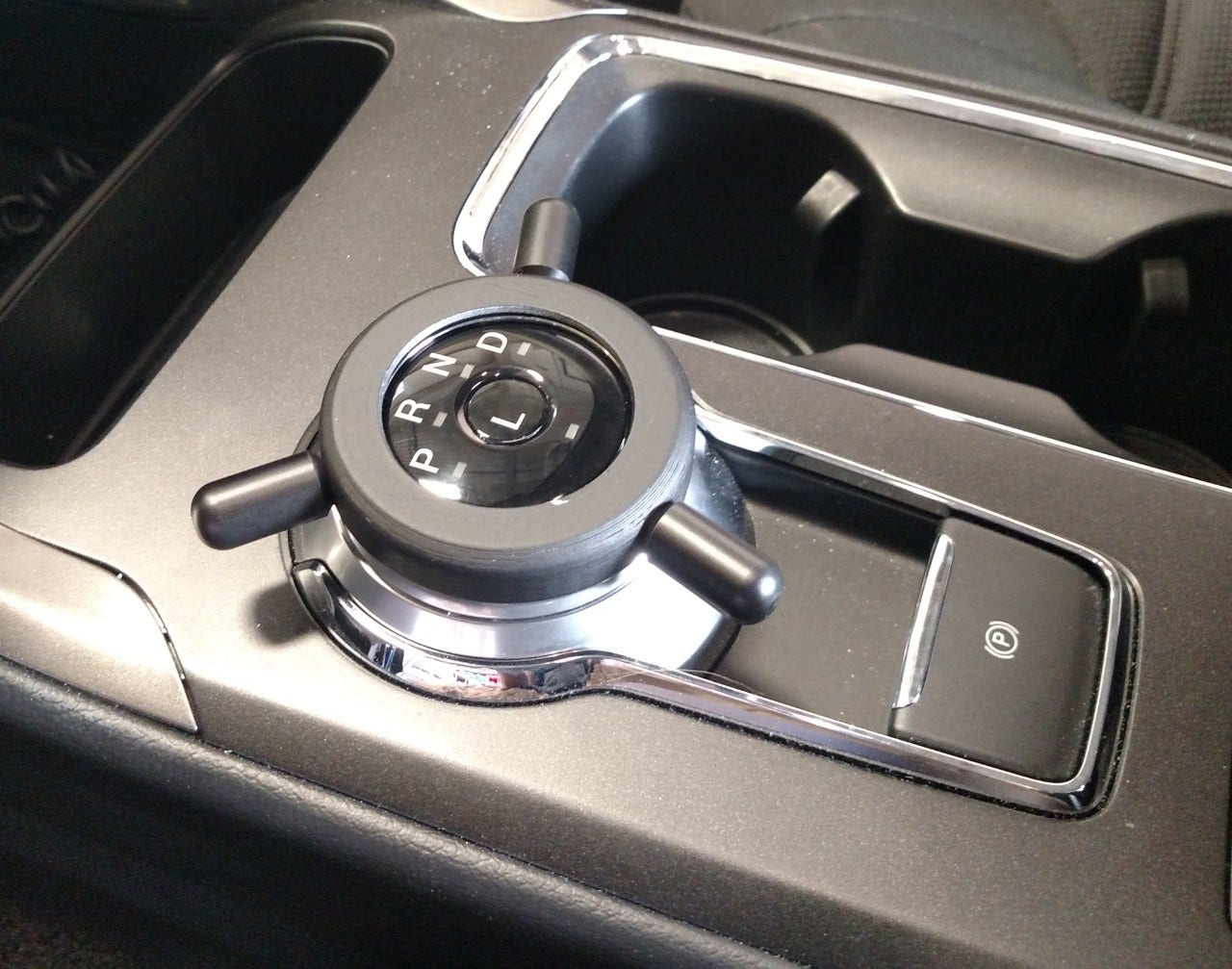 rotary style gear selector extension driving aid