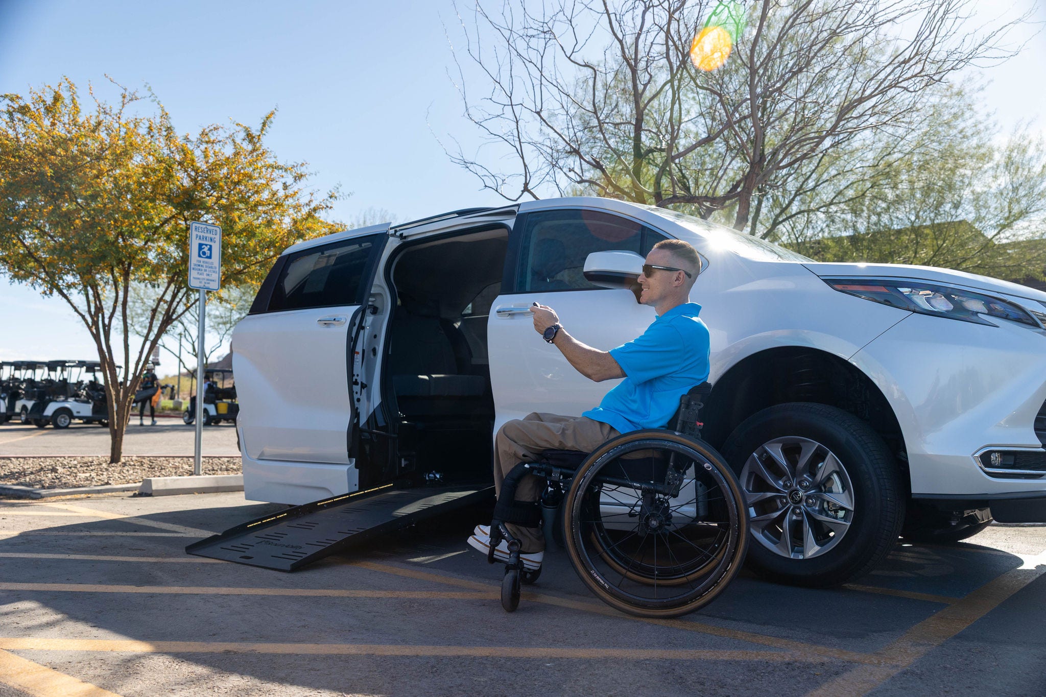 United Access customer experience lifestyle Nate outside WAV with side ramp extended