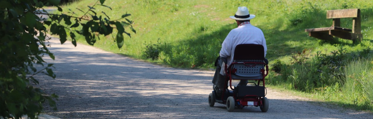 man in mobility scooter rental