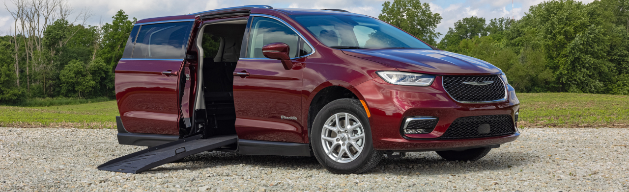 Red Wheelchair Accessible Van with it's ramp out