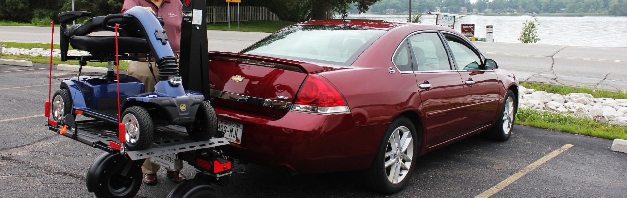 mobility scooter lift installed on vehicle