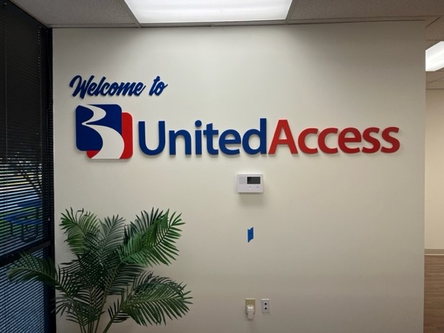 United Access logo on wall