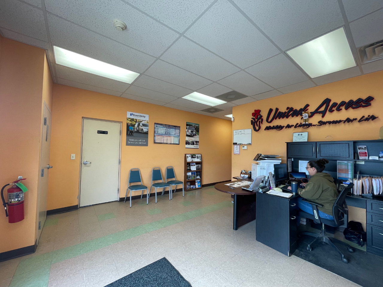 lobby area with desk and chairs