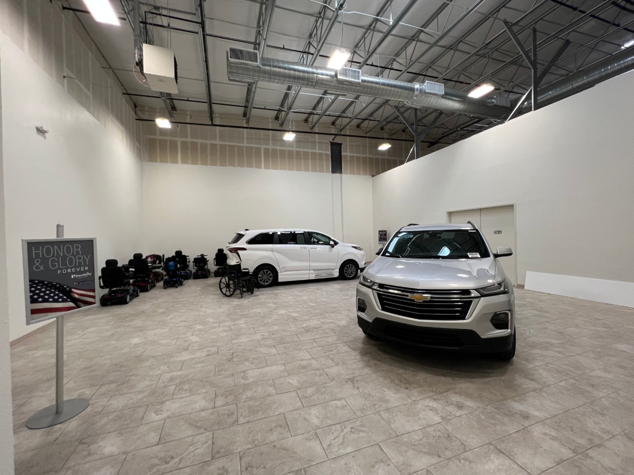 wheelchair accessible vans in dealership showroom