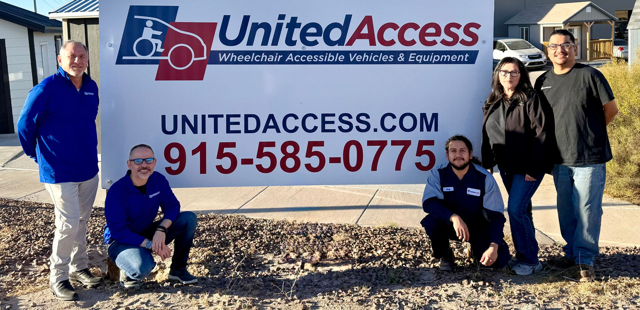 United Access El Paso team in front of United Access Sign