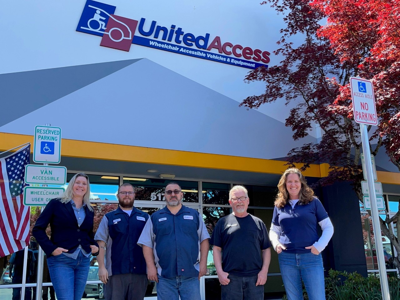 team photo in front of building