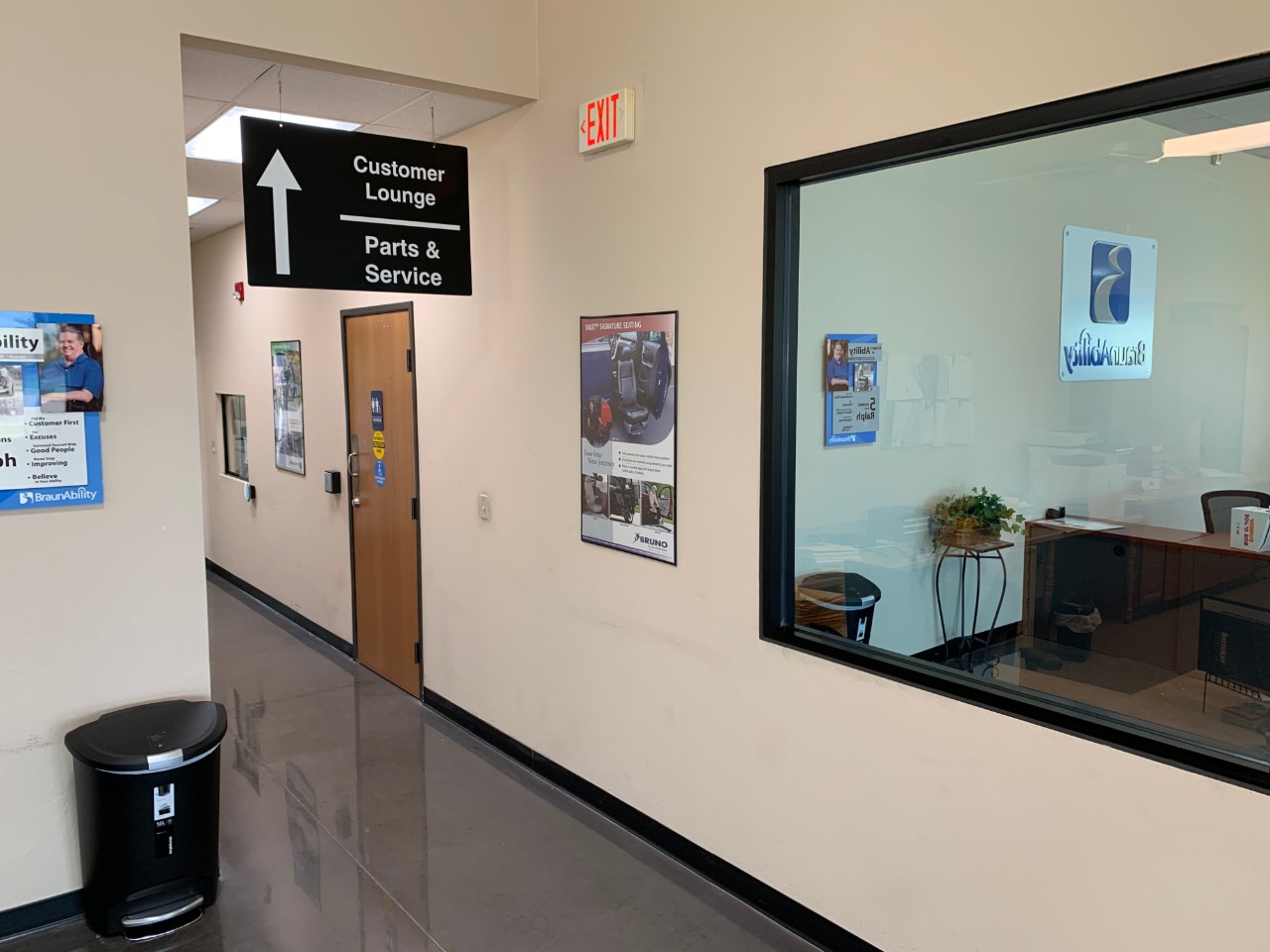 sign for service department in hallway