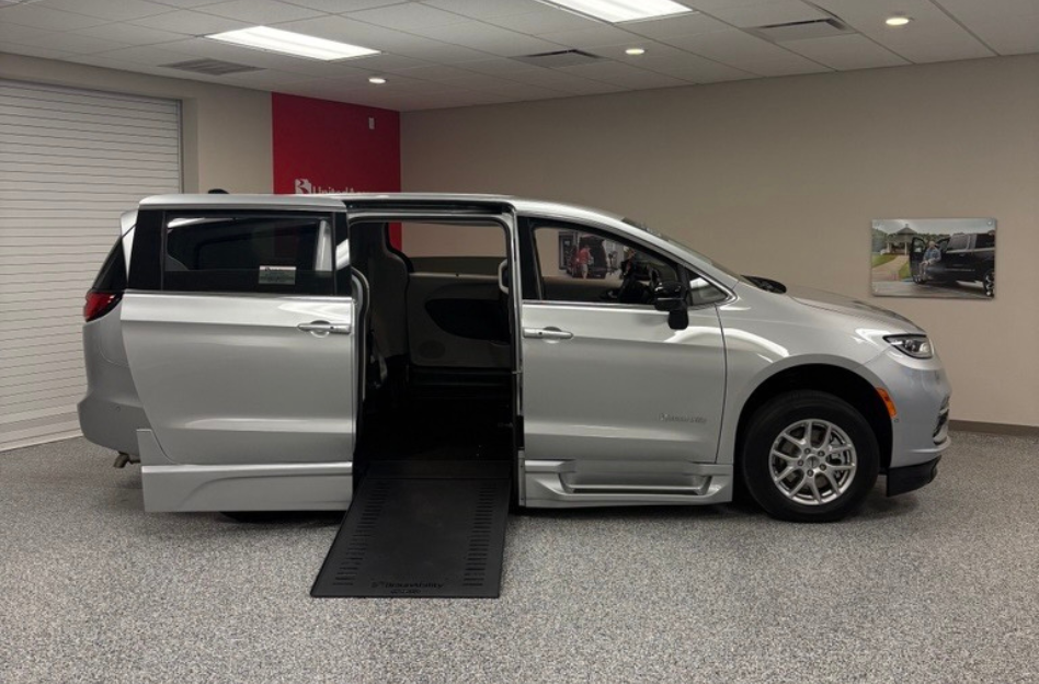 silver wheelchair accessible van with side-entry ramp deployed