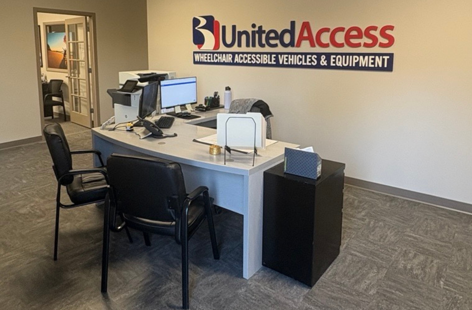 desk and chairs inside store for working with a mobility specialist