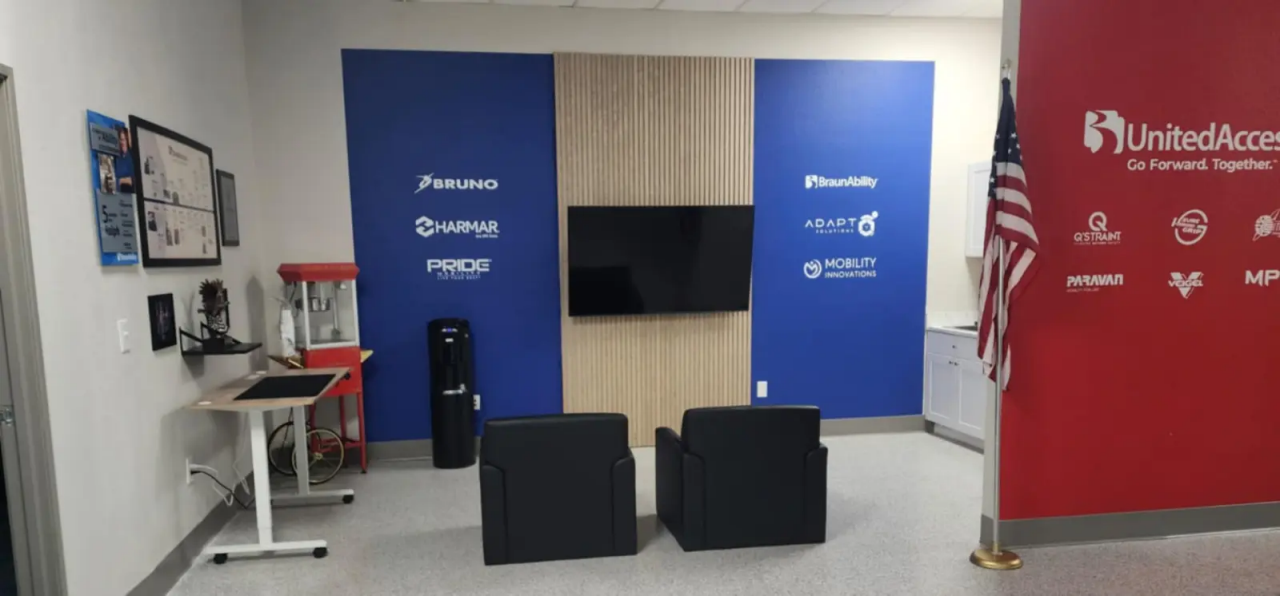 waiting area with couches and tv