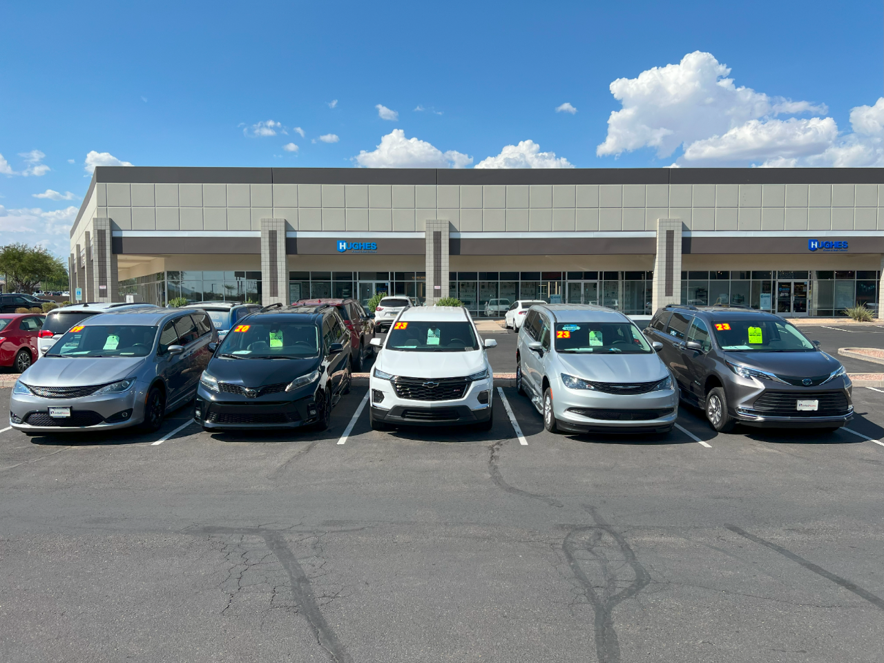 line of wheelchair accessible vans in parking lot