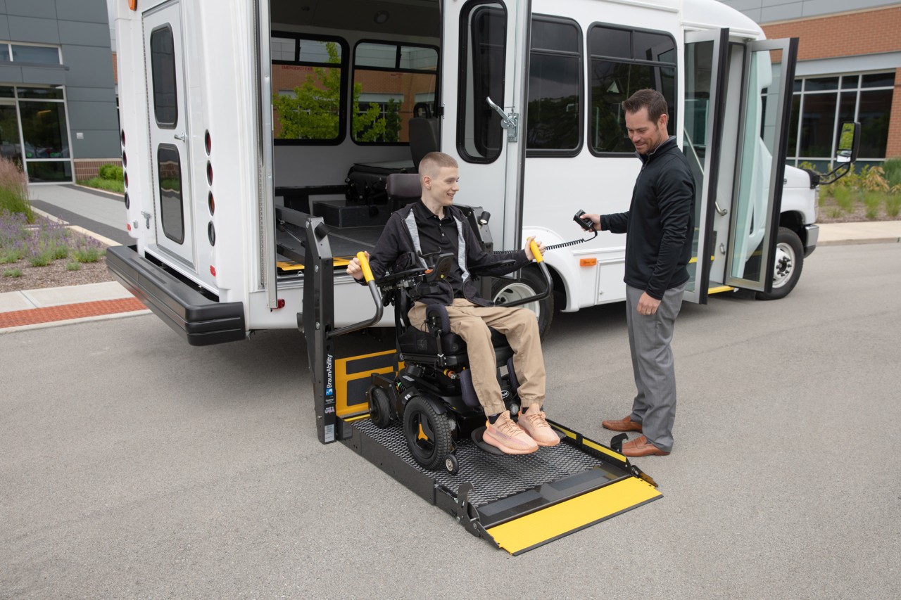 ADA Lifts side entry wheelchair lift white bus