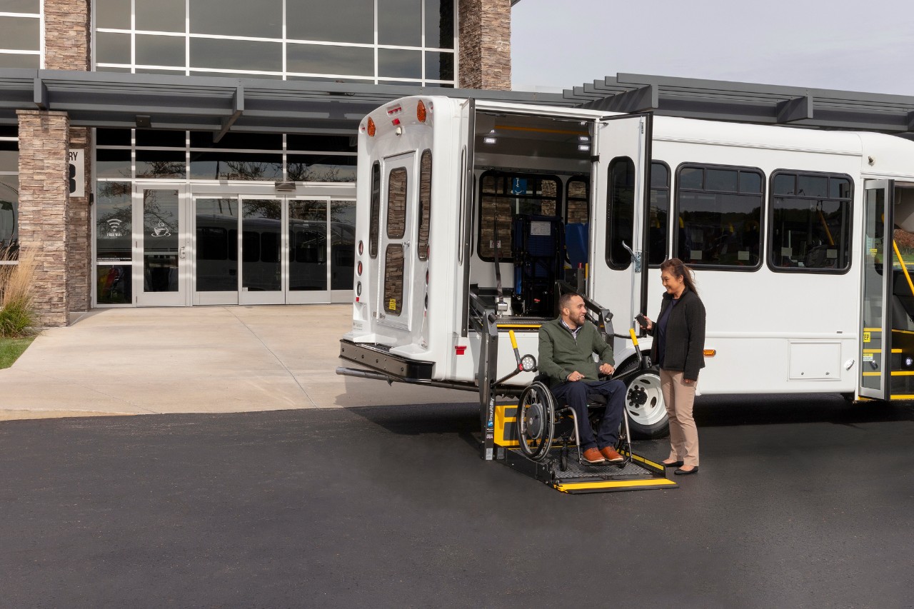 ADA Lifts side entry wheelchair lift white bus