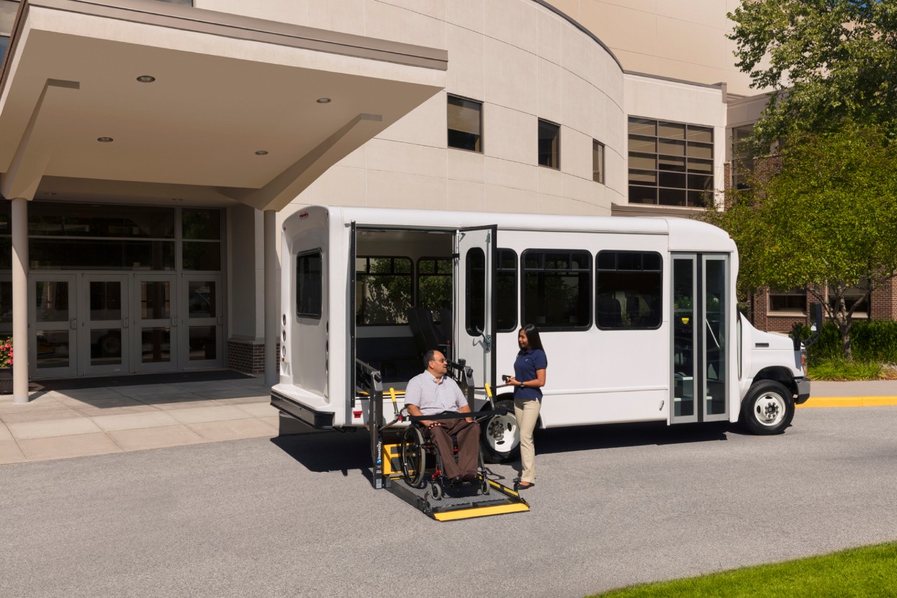 ADA Lifts side entry wheelchair lift white bus