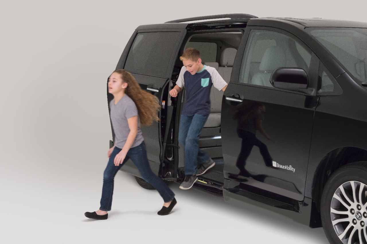 Black BraunAbility Toyota Sienna Hybrid InFloor People Exiting Side Door