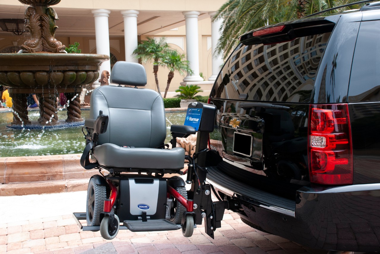 Harmar AL580 Scooter Powerchair Lift Installed on Vehicle Side Angle