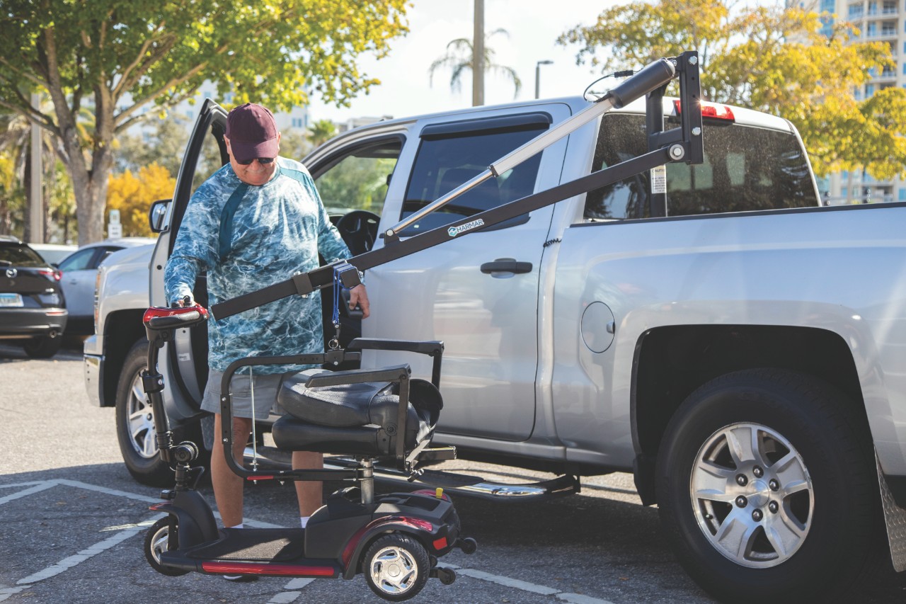 Harmar AL825 Truck Wheelchair Hoist Lift installed on truck