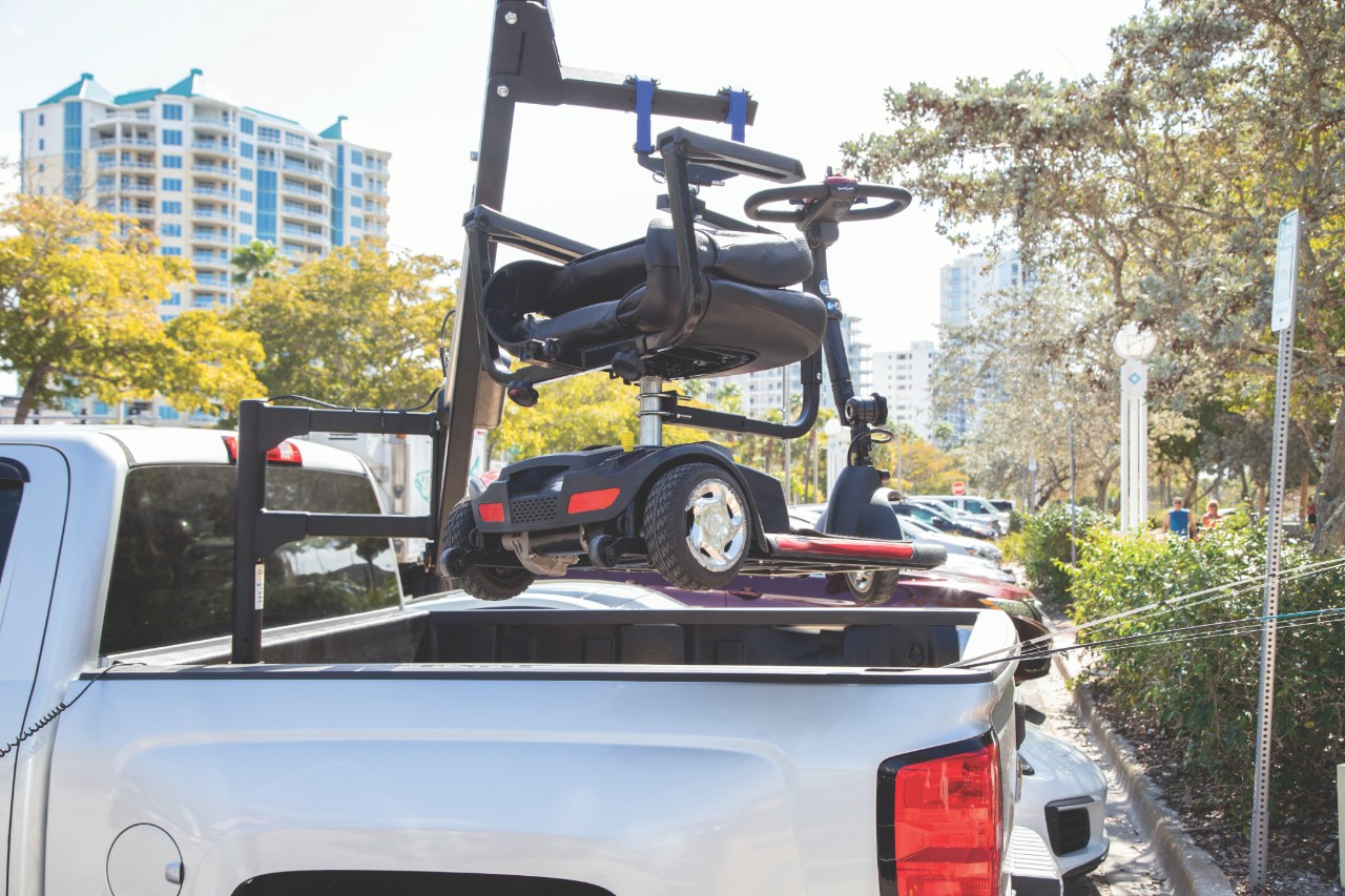 Harmar AL825 Truck Wheelchair Hoist Lift installed on truck