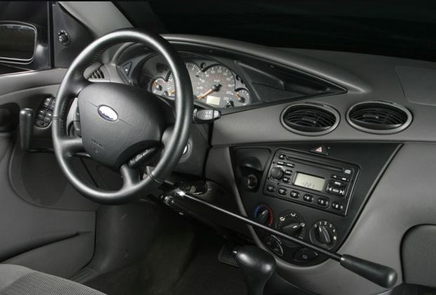 dual gas and brake control arm driving aid