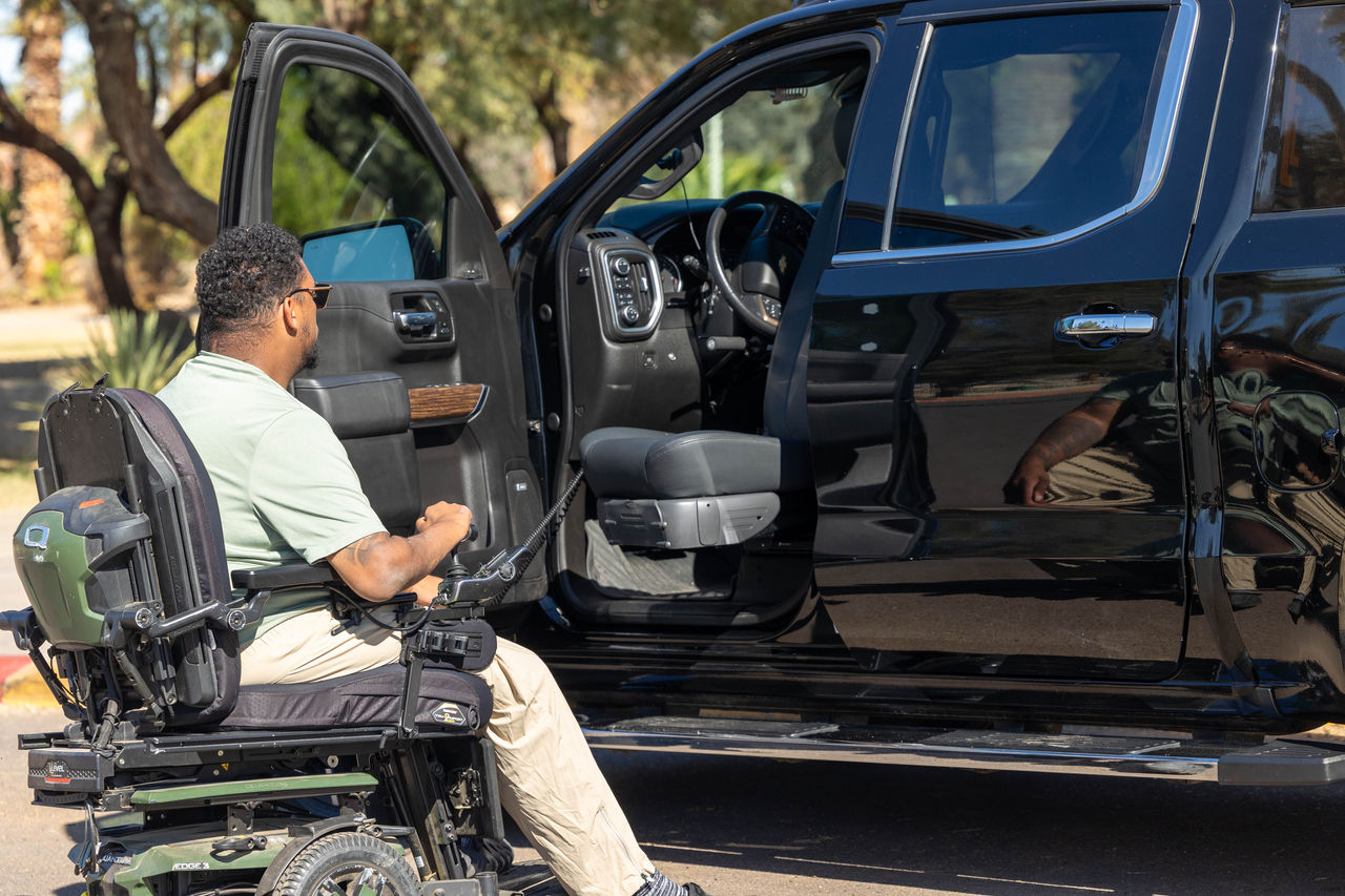 family in front of accessible Honda van