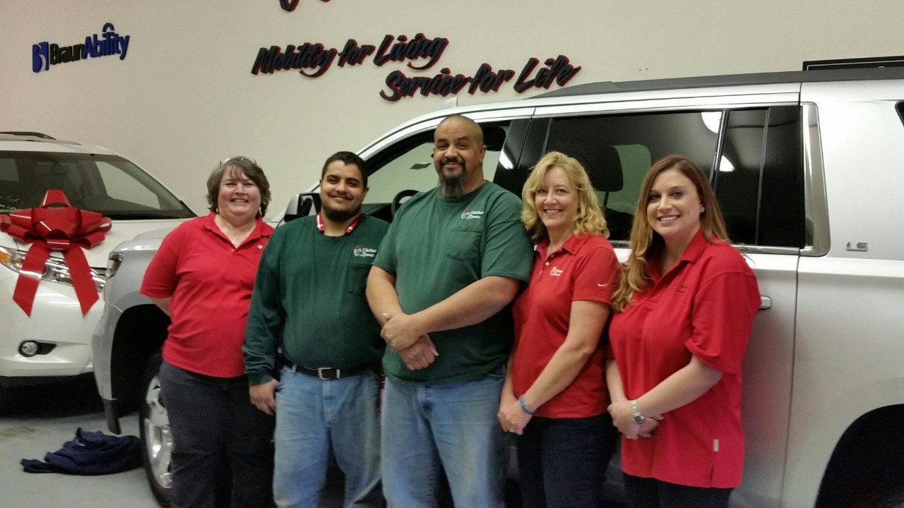 wheelchair accessible vehicle dealer team by van